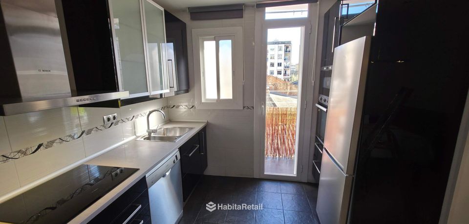 Cocina con salida a la terraza
